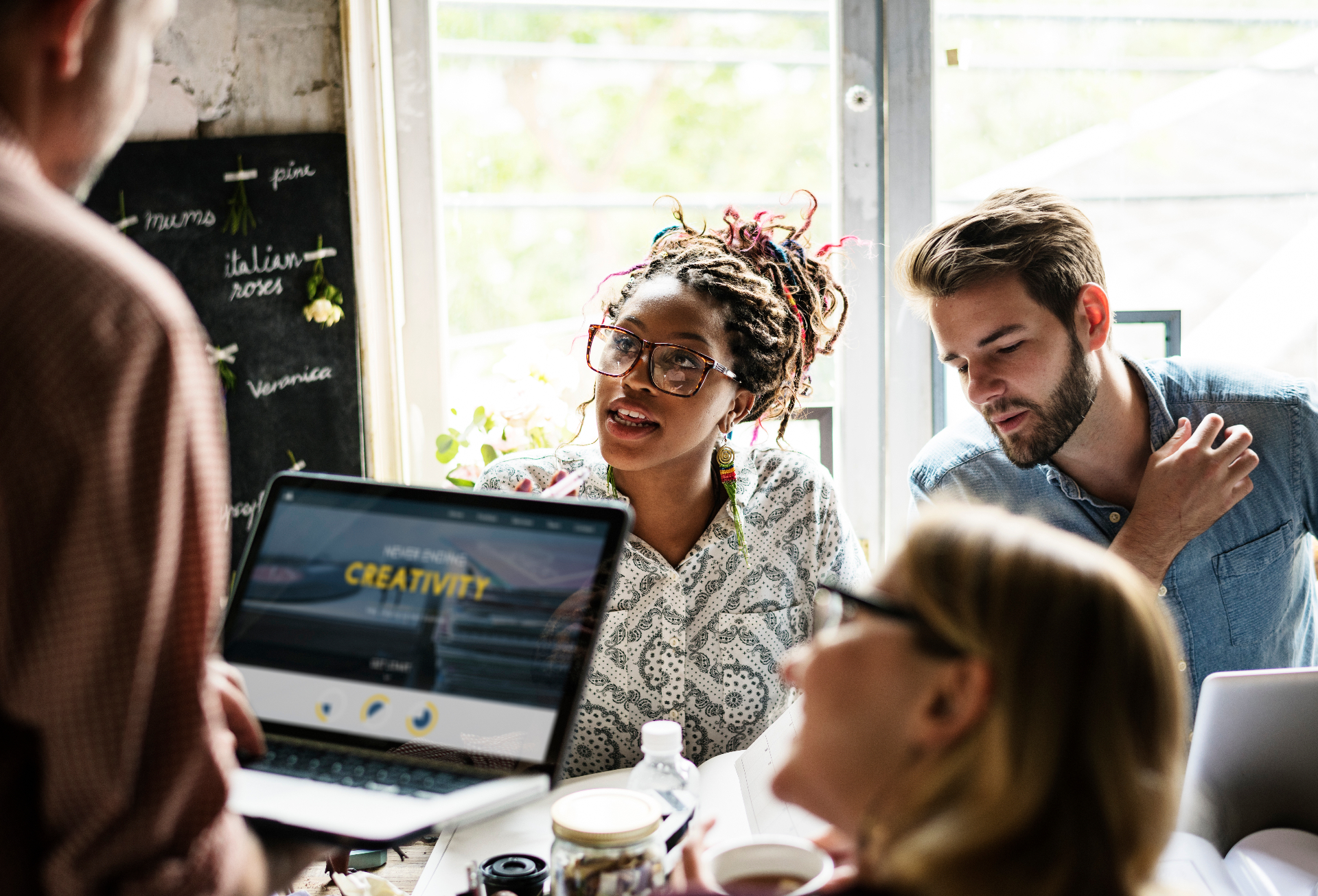 Innovative Creative Agency team collaborating on a client's website design and SEO strategy